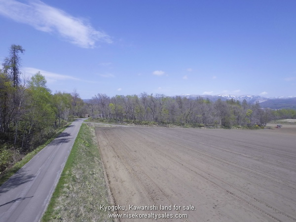 332-125-129_Kawanishi_Road Frontage looking in a north westerly direction.